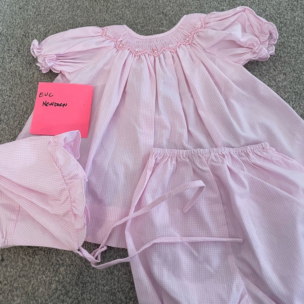 Newborn pink smocked dress